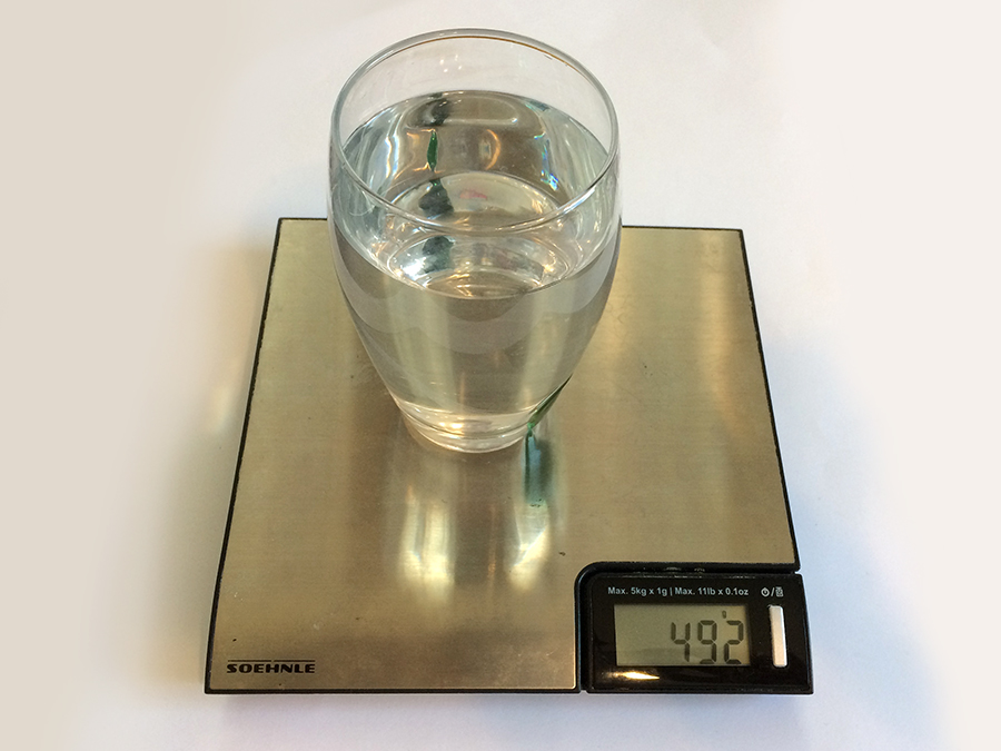 Glass of water weight with a kitchen scale