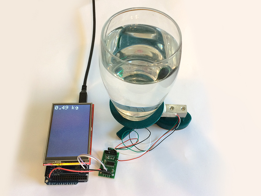 Glass of water weight with a load cell